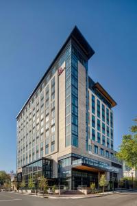 a large office building with a lot of windows at Marriott Dallas Uptown in Dallas