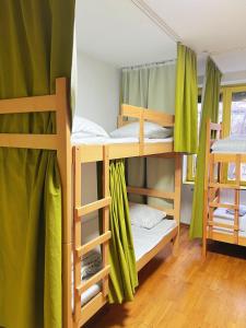 Postel nebo postele na pokoji v ubytování Eleven Hostel