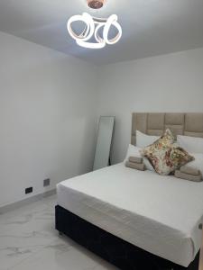 Ένα ή περισσότερα κρεβάτια σε δωμάτιο στο Oceanic gem