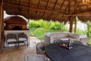 Χώρος καθιστικού στο House with cenote and caves in Puerto Aventuras