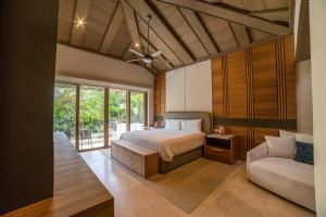 Ένα ή περισσότερα κρεβάτια σε δωμάτιο στο House with cenote and caves in Puerto Aventuras +32 φωτογραφίες