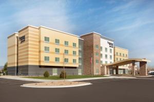 a rendering of a building with a parking lot at Fairfield Inn & Suites by Marriott Boulder Longmont in Longmont