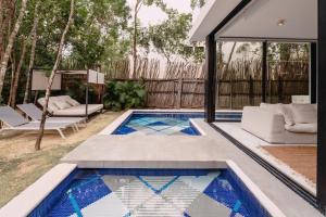 Galeriebild der Unterkunft Executive Unit In Gated Community In Aldea Zama in Tulum + 25 Fotos