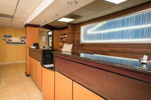 a waiting room with a cash counter in a hospital at Fairfield Inn & Suites by Marriott Knoxville/East in Knoxville