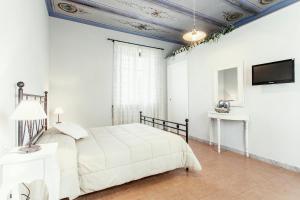 Postel nebo postele na pokoji v ubytování B & B Da Ferro