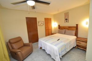 Postel nebo postele na pokoji v ubytování Cozy Locale Pearl
