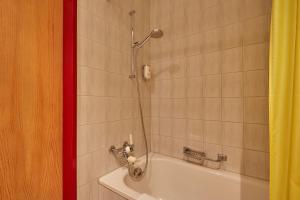 Koupelna v ubytování Hotel Sonnwendhof Engelberg