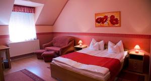 Postel nebo postele na pokoji v ubytování Arany Patkó Panzió