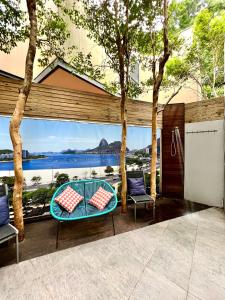 a patio with a table and chairs in front of a window at Bondi Stylish Bedroom Close to the Beach in Sydney