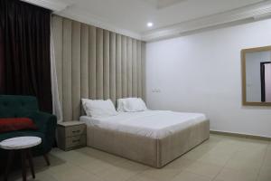Postel nebo postele na pokoji v ubytování Serviced Apartment Direct
