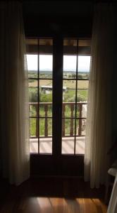 A balcony or terrace at El Rincon Del Villar
