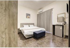 Postel nebo postele na pokoji v ubytování Magic Waves Hotel Aqaba