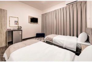Postel nebo postele na pokoji v ubytování Magic Waves Hotel Aqaba