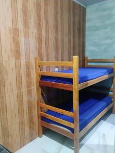 Ένα ή περισσότερα κρεβάτια σε δωμάτιο στο Pousada Plataforma