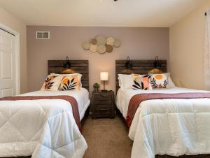 Postel nebo postele na pokoji v ubytování Game&GatherLodge + 138 fotografií