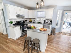 Kuchyň nebo kuchyňský kout v ubytování Game&GatherLodge