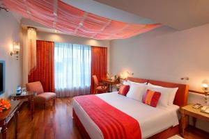 A bed or beds in a room at ITC Rajputana, a Luxury Collection Hotel, Jaipur