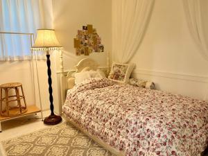 Postel nebo postele na pokoji v ubytování Daejeon Special Stay