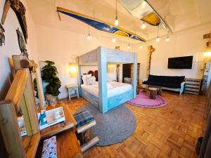 a bedroom with a large bed in a room at Beachwave Camps Bay in Cape Town