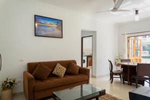 A seating area at 2BHK Apartment with Pool access