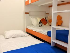 Postel nebo postele na pokoji v ubytování Kuching City 3B2B 10pax - The Podium Hospital Aeon Mall + 49 fotografií