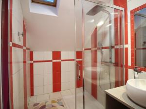 a bathroom with a shower and a sink at Chalet Mont-Dore 110m², 10 pers, parking, animaux admis - FR-1-608-280 in Mont-Dore +9 photos