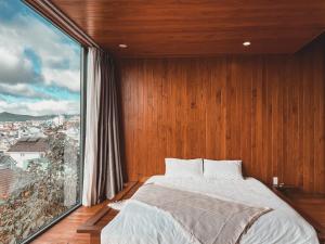 Krevet ili kreveti u jedinici u okviru objekta Lux Nest hotel