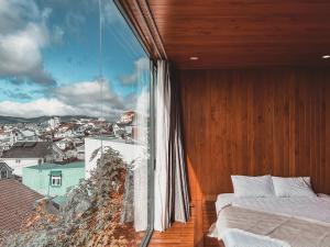 Krevet ili kreveti u jedinici u okviru objekta Lux Nest hotel