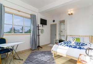 Letto o letti in una camera di Olhumathi View Inn