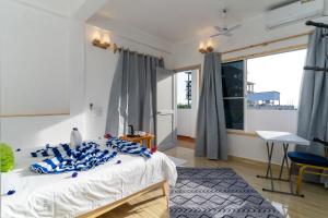 Letto o letti in una camera di Olhumathi View Inn