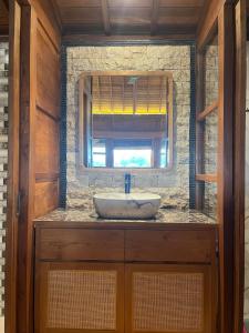 a bathroom with a sink and a window at Villa Gong bali in Ubud +7 photos