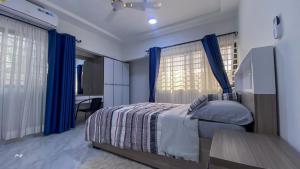 Postel nebo postele na pokoji v ubytování Villa Fafa