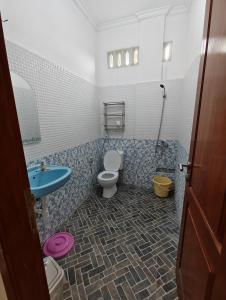 Koupelna v ubytování Ike's Homestay