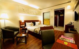 Postel nebo postele na pokoji v ubytování Hotel Regent Grand
