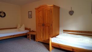 Postel nebo postele na pokoji v ubytování Gästehaus Stadtschaenke