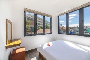 Postel nebo postele na pokoji v ubytování D View Apartment