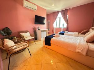 Postel nebo postele na pokoji v ubytování Venice Hotel Hua Hin