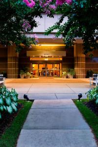 a building with two birds sitting in front of it at Richmond Marriott Short Pump in Short Pump