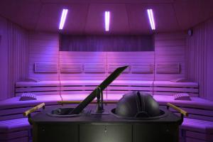 a purple room with a baseball bat and a helmet at Rome Marriott Park Hotel in Rome