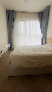 Ένα ή περισσότερα κρεβάτια σε δωμάτιο στο Masteri Centre Point - CT Land +14 φωτογραφίες