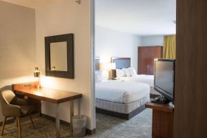 Voodi või voodid majutusasutuse SpringHill Suites by Marriott Logan toas