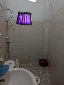 Un baño de Villa Green House