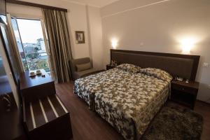 Postel nebo postele na pokoji v ubytování Hotel Olympos + 22 fotografií