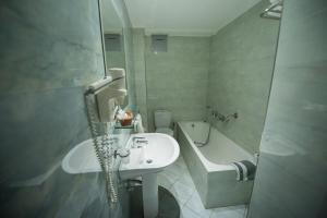 Koupelna v ubytování Hotel Olympos