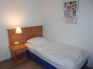 Postel nebo postele na pokoji v ubytování Hotel Fährhaus