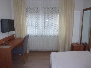 TV a/nebo společenská místnost v ubytování Hotel Fährhaus