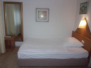 Postel nebo postele na pokoji v ubytování Hotel Fährhaus