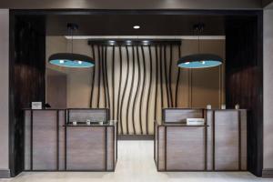 two tables in a room with two lights at San Diego Marriott Del Mar in San Diego +58 photos