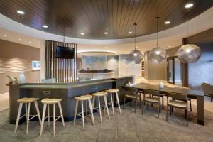 TV a/nebo společenská místnost v ubytování Springhill Suites by Marriott Vernal