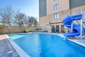 a blue water slide in front of a building at SpringHill Suites Pigeon Forge in Pigeon Forge